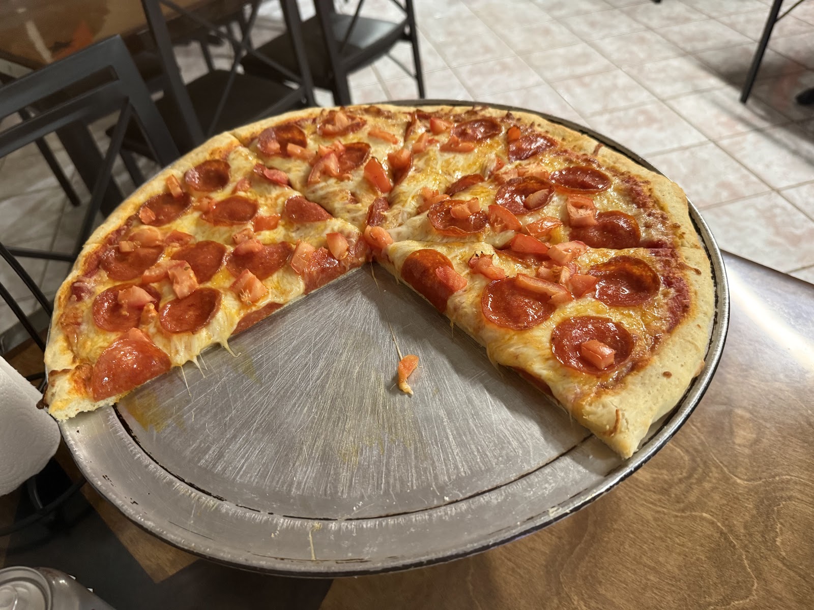 Pepperoni and tomato pizza fresh from the oven