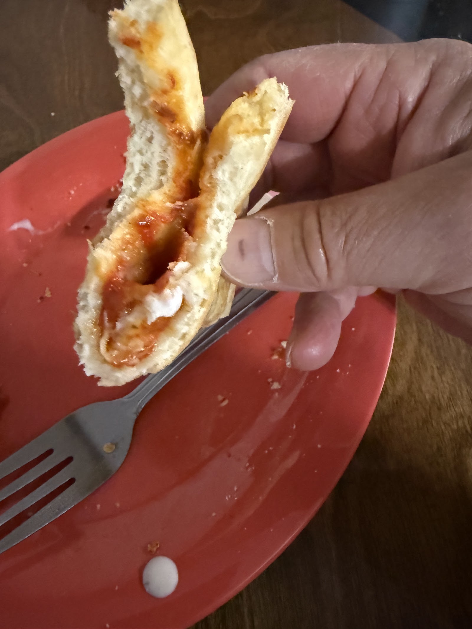 Close up of melted cheese and pepperoni pizza